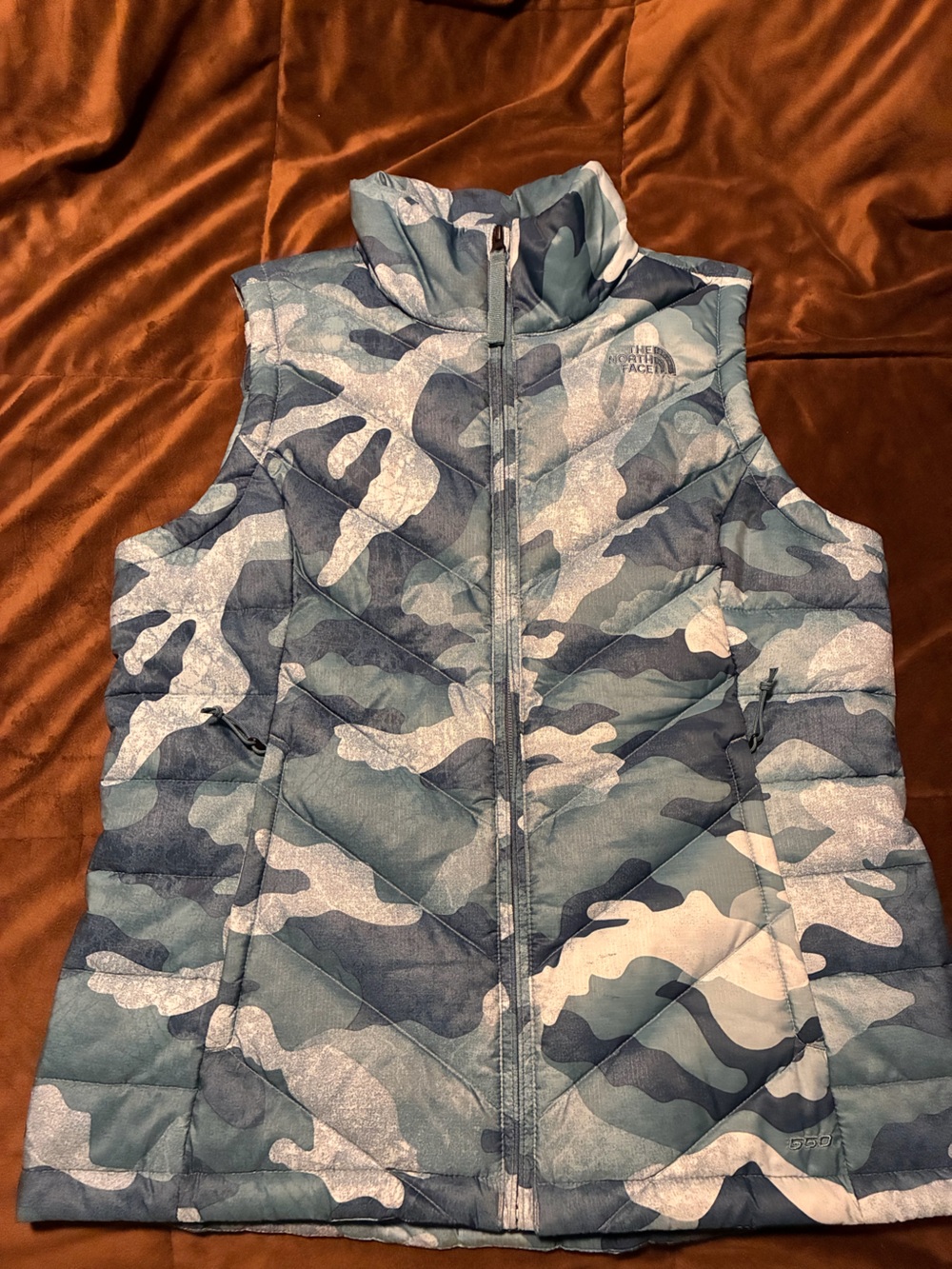 The North Face Camo Quilted Puffer Vest, size medium, warm and comfortable